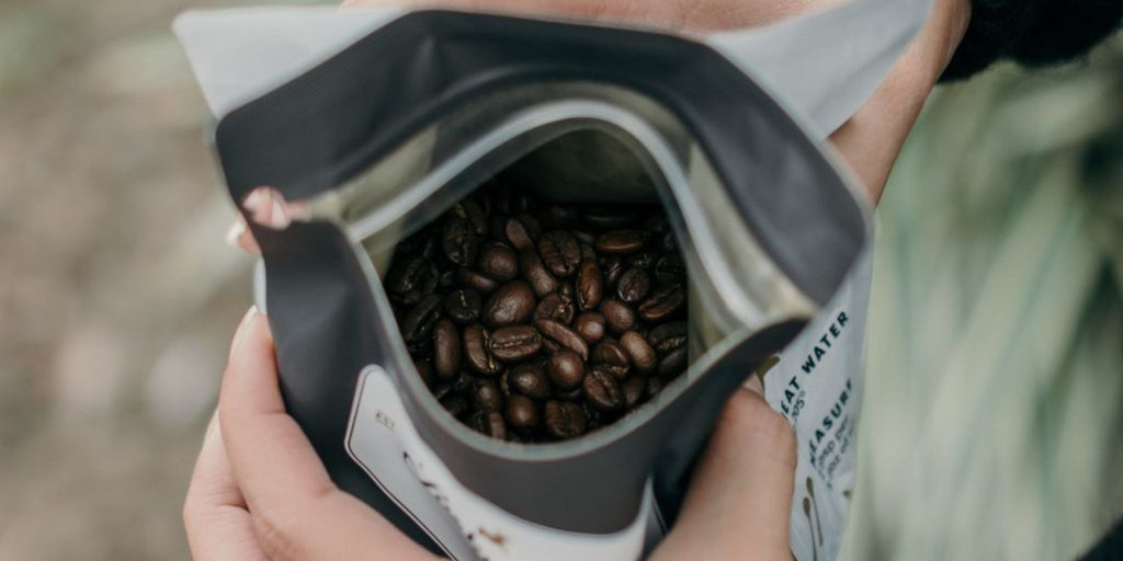 a bag of freshly roasted coffee beans