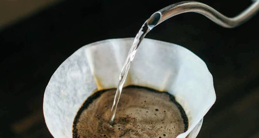 Pour-over coffee showing how water quality impacts coffee extraction at Lucky Goat Coffee Co.