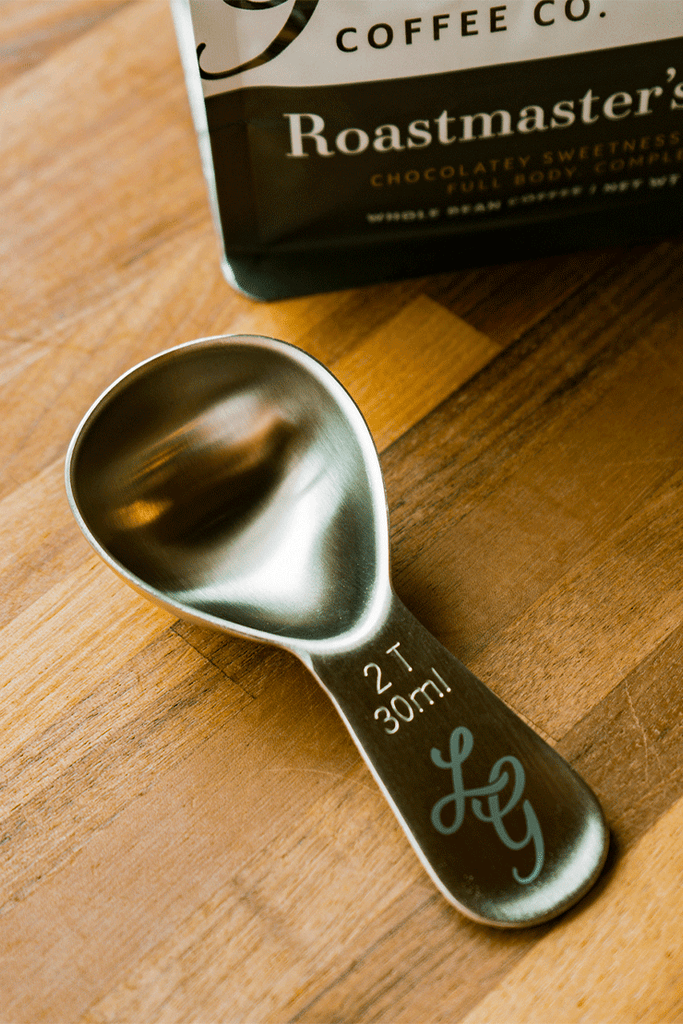 LG Coffee Scoop sitting on table