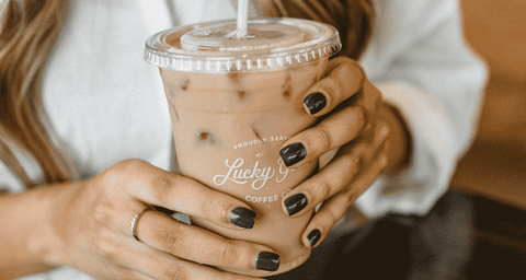 Lucky Goat Cold Brew in hand at Lucky Goat Coffee Co.